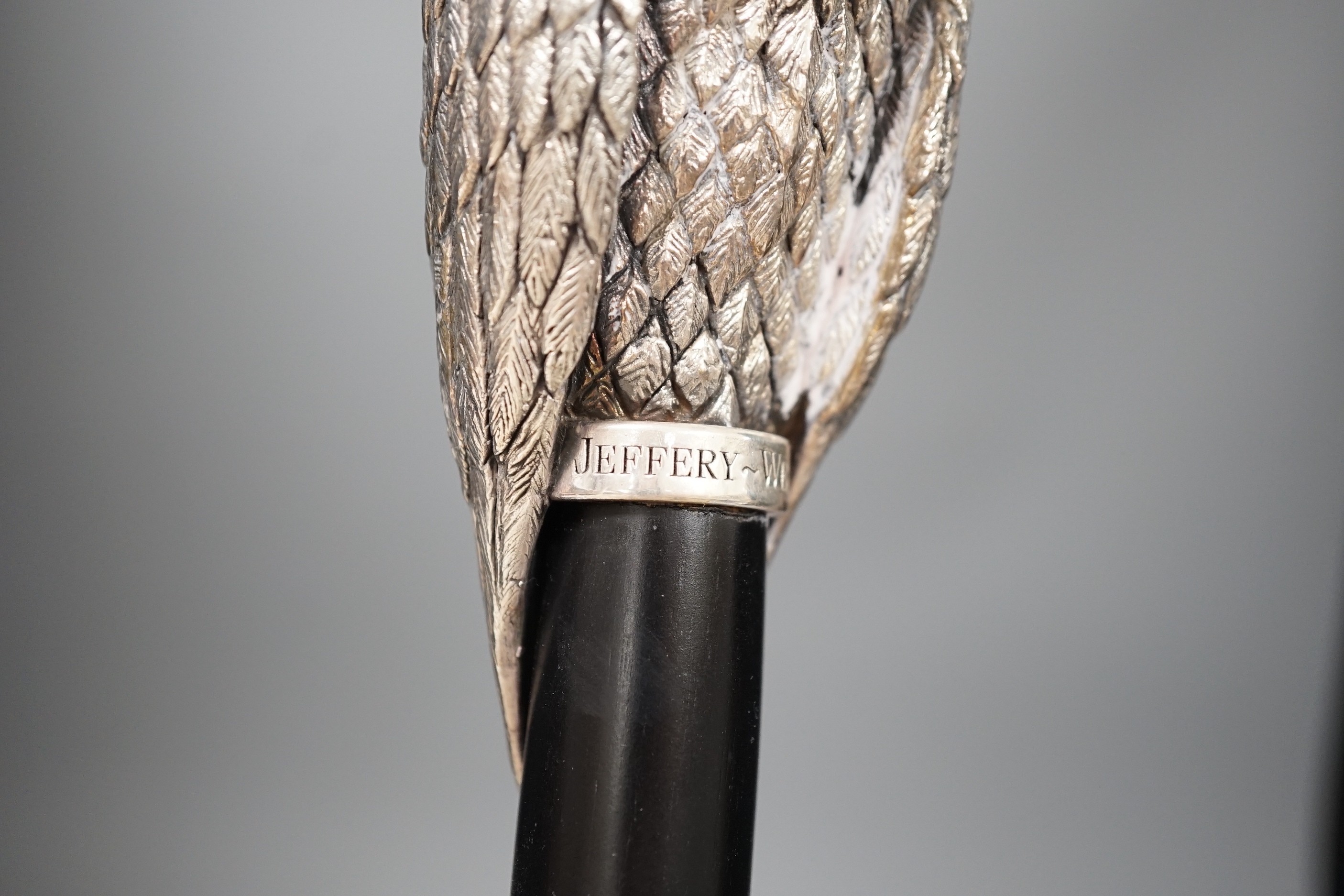 A Jeffery West umbrella with modern filled silver Thorondor eagle head handle, 93cm total length